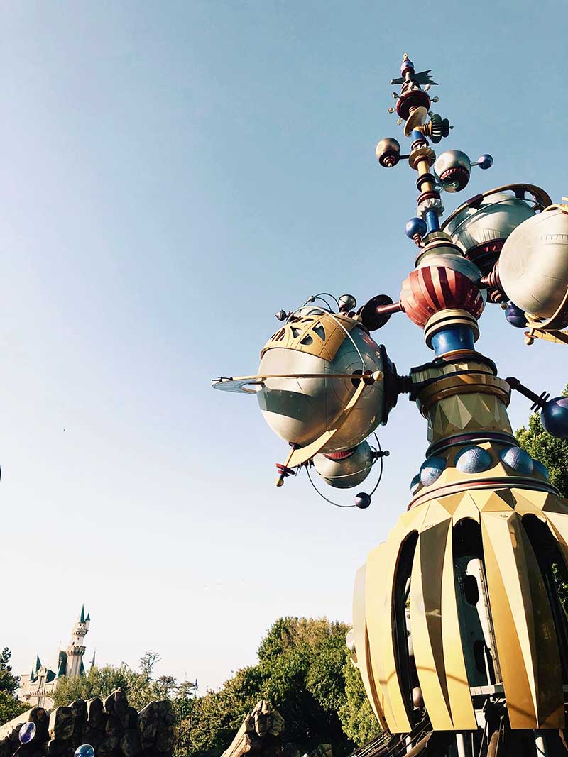 Disneyland Tomorrowland with Sleeping Beauty Castle in the Distance