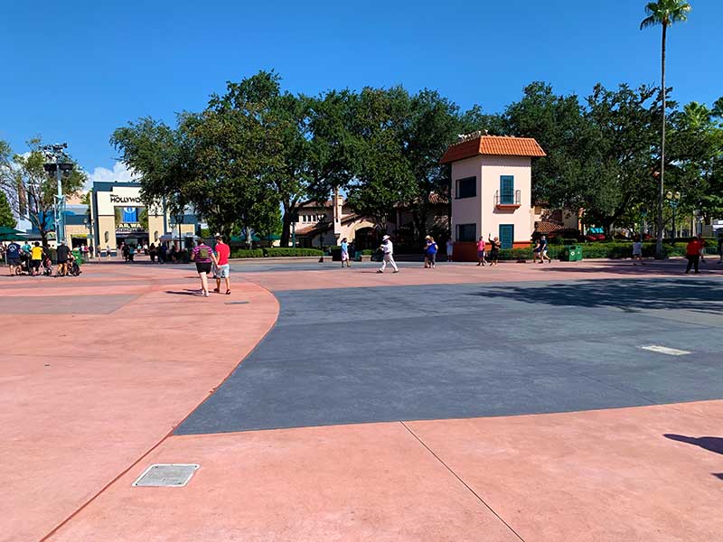 We did it! We just spent 2 weeks at Walt Disney World and experienced all of the post-closure changes in person. In this post we'll share it all with you. We'll share our experiences, the good and the bad, our thoughts on the whole can of worms plus some tips. Hang on, this is going to be a long post covering everything about the trip! There will also be a lot of pictures, many of which will have few to no people in them. Some shots are of places that are always crammed tight with people! We stayed at multiple Disney World Resorts, used Theme Park Reservations (and changed some while there), visited all the parks multiple times, dined at Quick Service and Table Service locations, and went to Disney Springs multiple times. We were very busy! We also went to Shades of Green to see what was going on there but that will be another post. Note: This post will present to you just what we had to put up with in order to visit Walt Disney World during under the current conditions, so that you may make an educated decision whether a Walt Disney World vacation is right for your family at this time. Please also check out our Planning Guide for these unusual times. BLUF Bottom Line Up Front, we think this is an amazing time to go to Walt Disney World! You just have to put up with the bad (covid inconveniences), to experience the very good (extreme low attendance and amazingly high cast to guest ratio)! Disclaimer: Those who are afraid of catching covid, those who are in the at risk population, or those who are at risk of  passing it on to someone who is at risk, should not be going to, or working at WDW.  Everyone else, who is allowed to travel to WDW by command guidance should seriously consider it. It is a once in a lifetime chance to experience Walt Disney World's Parks with MINIMAL crowds! General Disney World Information Here we'll discuss generalities and global policies/issues. Further on in the post we will cover specific areas of interest. Temperature Checks In order to enter a Disney Theme Park, Disney Springs, a Disney Table Service Restaurant, and some partner Table Service Restaurants, you'll need to get your temperature taken. Under 100.4 is good to go. If you are over, they will direct you to a cooling off area (under a tent outside) to cool off and then you can try again. If one person in the party is over temp, the entire party will be denied entry. Animal Kingdom Temperature Check Station Masks While there, the last week in August and the first in September, it was HOT and humid. Temps were 93 - 97 most days with a high day of 99. All days had a "real feel" in the triple digits. This made the requirement to wear a mask when outside your room pretty rough. This is the hardest thing that you will have to deal with during your stay. Disney requires that everyone age 2 and over wear specific types of masks (described in our Covid planning post) at almost all times (except in your room, while seated at a restaurant, or when "actively" eating or drinking while stationary and socially distanced) even if you are nowhere near anyone. You may not take your mask off for pictures no matter how far you are from anyone! Disney does not want photographic evidence of people not wearing masks in the parks. You also may not remove your mask on rides. Relaxation Stations are available in the Theme Parks (2 per park), they are areas where you may enter, stay socially distanced and take off your mask. You don't have to be actively eating or drinking to do so. Why this is safe and doing the same in the theme park is not is never explained. Social Distancing On their own, people tend to bunch up when in lines, entering buildings, etc. It is happening (occasionally) at WDW. Disney is actively working to combat this. "Wait Here" stickers or dots to stand on are everywhere on the ground where people would line up for attractions or stand once in them, or where they enter buildings, parks, or transportation. Random cast members are tasked with holding social distancing reminder signs and circulating through the park (they love this job, not!). Children's Activities Cast Members have been re-tasked to be the mask and social distancing police. These cast members in yucky yellow shirts will remind guests if they stray from the rules (mainly mask wear). Other cast enforced this stuff to varying degrees, some couldn't care less. Almost all were observed to be polite, but there were 2 or 3 observed interactions where the cast member raised their voice in an angry manner. All restaurants and shops have maximum allowed capacities that are a percentage of the actual fire code capacity, in order to help with social distancing. Some doors are entry only and some exit only. Cast members are stationed at the doors with iPhones with apps connected to a totaling system. Those at all the in doors tap the + on their app for everyone going in and those at all the exits tap the - for each guest that leaves. If they reach capacity inside, they stop people from entering until they are under. All elevators are marked to be used by 1 party only. Some also say max of 4 sharing the same room! Attractions have severe social distancing imposed. Smaller ride vehicles will seat only 1 party. Bigger vehicles will have a party in the front and rear with separation. Theatre style seating skips rows and staggers seating in every other row. (imagine me by myself in the 6 seat Test Track car or me and 2 others in the 12 seat Dinosaur car) Queues for the attractions have the 6 foot Wait Here floor stickers and either skip rows in the back and forth queues or place vertical Plexiglas between rows where this isn't possible. This stretches the lines out into the park (into sun, rain, etc.). They have put long extensive lines of Wait Here stickers for lines that never materialize. Most payment locations have a Plexiglas wall between the cast member and you. This often makes communication difficult with the masks and the wall. I like most guests and cast stand a little to the side of the wall so just the masks interferes with communication. Most everyone is fine with this at Disney and at home. But I had one cast member who moved to keep the plexiglass between us. There are more specifics that we will discuss as needed in the various sections below. Increased Cleaning Disney World is doing what they call Enhanced Cleaning. In my opinion they should have been doing most of this all along! All surfaces are constantly wiped down or sprayed with disinfectant (though I saw some shoddy work, e.g. getting about 70% of the table being wiped...) You'll see cast in the parks wiping down poles. And they stick your TV remote in your room in a baggie??? Seven Dwarfs Mine Train on the right Free Hand Sanitizer Disney World has provided hand sanitizer dispensers everywhere! (This is part of the reason that you couldn’t get it for so long , big companies buying it up) It is at every location that you could think of in multiple dispensers, Attractions, restaurants, resort hotels, walkways, merch shops, literally anywhere that you might think I'd like some hand sanitizer, there it is! There are also hand wash stations all over with water, soap, and hand towels. This area of Epcot's World Showcase is typically packed  wall to wall with people (pic at 12:30) Touchless Payment Disney has integrated other touchless payment options into their existing Magic Band payment system (with many new touchless devices replacing the existing ones). This seems to really have mucked up the Magic Band payment system. I experienced many, many times when I'd have to tap my band and enter my pin numerous times to get it to work. Also, in the past when purchasing if you just looked continuously at the Magic Band scanner, no words were needed, the cast member just knew that's how you wanted to pay. But now you have to say I want to use my band as there are multiple options to use on the scanner. MDT THOUGHTS - The temperature checks were quick, efficient, and almost a non-event. Mask wear is not normal and there are many areas of the country where it hasn't been as in vogue as it has in other areas. People forget about them. I myself walked out of my room at least 4 times without one and I saw others who would forget to put them back on as well after having them off in the parks, this led to them being chased down by a cast member. MDT TIPS - Make no mistake, good hygiene plays a big part in staying healthy. I travel to WDW often, and I used to get sick with a common cold from time to time after returning home or while still at WDW while on long trips. Since I upped my awareness of what and how I touch, consciously increased the use of hand sanitizer and hand washing as much a feasible while out and about at WDW and wiping down airplane and resort room surfaces I've stayed cold free post Disney. This should always be your method of operation while on vacation! Even after this blows over and COVID-19 becomes just another one of the seasonal flus (like the swine flu 2009 (killed 80K) and Hong Kong Flu 1968 (killed 100K mostly elderly, it's the strain that is so deadly to elderly now) after we achieve herd immunity. I found the damp mask sucking up against my face when I inhaled to be very irritating and uncomfortable. I used a soft piece of wire in the shape of a U with a short 90 degree bend down on each end to keep the mask from sucking in. The short bit sticking down from the bend slipped into the channel the elastic went through on my homemade masks. Hard to see at this angle, but the wire is bent in a U shape out in front of the nose in the bottom image. Often when walking out by myself and I couldn't see another human at all for a long distance I'd drop my mask off one ear for a little break. I and many other people kept a water bottle with them whenever out of their room, and by doing so could stop wherever they'd like (6 feet from others) pull off the mask and sip their water to get a break from it. I and many others offered to share space (elevators, assigned group sections of buses, Skyliner cars, the single large table inside in the air at Baseline Taphouse, etc.) as long as both parties are fine with it, it helps avoid waits during busy times. I'd say "You can join me if you like, or I'd tell the bus driver that I was fine sharing my assigned section of the bus with anyone who was OK sharing. Another single rider behind me in line and I shared a Skyliner during peak travel time (park open) from the Caribbean Beach to Hollywood Studios. Some people who aren't scared will accept, others won't. Cast members don't like telling you to fix your mask anymore that you like hearing it (well the majority don't), so make it easier on both of you. If you’re taking a breather and see you are approaching a cast member, straighten yourself up. Then they won't have to engage. I Never heard "You should have had your mask over your nose.", they just tell people to fix it if it's not to standards. Walt Disney World Information on Specific Areas Below we'll discuss specific areas of interest and get a little deeper. Transportation Getting There Air transportation was a novel experience! Almost no one in airports, whizzing through TSA, very empty planes, and instant luggage service were all wonderful. My early morning direct flight from Cincinnati to Orlando International had about 15-20 people on it besides crew. Orlando almost seemed abandoned; I saw so few people. Orlando International Ground Floor My bag, along with the others from my flight, was sitting next to the luggage carousel when I got there. You must carry your own bags at this time, there is no Magical Express luggage service. When I arrived at the Disney Magical Express counter, I was informed there could be a wait of up to 40 minutes between buses due to capacity limitations, but my bus was boarding when I got to the end of the empty line. Magical Express Welcome Area The driver loaded my bag and I got right on. There were probably 12 people on the bus heading to 3 resorts, and I was the only one that got off at mine. The driver retrieved my bag, I tipped her and was on my way. Getting Around Monorails I stayed at a monorail resort for part of my stay. Monorail service was great! They are running 5 monorail trains on the Resort Track as compared to the usual 4, to deal with the imposed capacity limitations. Each monorail passenger car has a front and back section each with its own doors. In each section there are forward and rearward facing bench seats that usually hold from 6-8 people depending on size. In-between is a standing/stroller/scooter area with grab poles that can accommodate a lot of people. During normal times the cars will fill up as needed often to squished capacity. Under the current social distancing rules there is no standing, the bench seats are for a single party, so 4 parties per car. The forward-facing seat in the car's front section backs up to the rearward facing seat in the rear section. Disney has draped a tarp between the two seats that leaves a good 2 to 4-inch gap around the edges. Trains were never full though and arrivals of the next train speedy. The resort loop still stops at all 3 resorts (Contemporary, Polynesian, and Grand Floridian), the Transportation and Ticket Center (TTC), and the Magic Kingdom. No one ever got on at the TTC, so Disney most likely is sending all of the very light load from the parking lot via the express loop. Note the PolynesianVillage Resort is now scheduled to reopen in Sumer 2021. The DVC portion will remain open. But the monorail station will be shutting down at some point in the future for the renovation that will be taking place. Skyliner  Skyliner service was not so smooth! I stayed at a Skyliner resort for 4 nights of my stay and the Skyliner was mostly inoperative (at least the section I was on, there are 3 loops) for 3 of my 4 days, causing the need to use buses. The Skyliner stops running (after offloading everyone at a station) in high winds or if there is lightning nearby. This can be often in the Central Florida summer, there were 2 bad storms while at that resort, but they were not present for the majority of almost 3 days’ worth of down time. Skyliner cabs, which hold up to 10 during normal times are currently limited to a single party (even if there is one of you!). Currently, Pop Century is the only Value Resort open and Caribbean Beach is the only Moderate. This means that for those desiring those price points these are the only options. No problem, we assume under normal loading limits, but a big one now based on how Disney World handles riders switching between Skyliner loops. A little background. The Caribbean Beach Resort (CBR) is the main station, where all 3 loops come together in a T. You have to get off and switch loops or routes here if CBR is not your destination. One loop, the base of the T runs to Hollywood Studios, one side of the top runs to Pop Century, while the other side goes to the Riviera and then on to Epcot. Caribbean Beach Skyliner Station With the reduced cab capacity lines form at both Pop and CBR. After waiting in the line at Pop and riding the Skyliner to CBR you are then forced to go to the back of the long line that has formed at CBR. This is also true for Riviera guests heading to Hollywood Studios. This is a very bad policy on Disney's part! Guests that have already waited in a line at another station should merge near the front into the lines for departing loops! Buses to Hollywood Studios and Epcot run much less often at Skyliner Resorts when the Skyliner is running. MDT TIP - If your main interest is making rope drop (park open) at Hollywood Studios or even Epcot, then opt for the more expensive Caribbean Beach over Pop Century so you'll only have to wait in one line or plan extra time into your morning. At the Riviera, plan time for a minimal wait at your own station if going to Epcot, and a minimal wait at your own station and a long line at CBR if going to Hollywood Studios. Buses Disney has engineered social distancing into their bus fleet by creating seating zones. They have placed numbers corresponding to the zone on some seats and do not use signs on others. Vertical pieces of plastic are zip-tied between the zones. Zones have from 2 to 4 seats. One party per zone, unless you offer to share. No standing is allowed. WDW Bus Seating Zones MDT THOUGHTS - Buses rarely had all zones full. We only experienced this when Hollywood Studios was opening, as lots of people are trying to get to the busiest park in time to secure their Rise of the Resistance Boarding Group. Boats Disney has also enforced social distancing on their fleet of boats with seating zones and skipped rows of seating. Parking Lot Trams Trams are not operating. But there is really very limited vehicle traffic and parking is close to the parks. MDT TIP - Vehicle traffic is mostly generated by locals. Currently locals are plussing up attendance the second half of Friday and the weekends. MDT THOUGHTS ON TRANSPORTATION - Were pleased with the state of Disney World's transportation. It was better than we feared. We'd expected long waits. But keep in mind that it is only working well under the severely reduced capacity because of the very low demand! As demand picks up the social distancing must be dropped, or the system will fail! Departing There is only one major change to your departure from your Disney Resort. You will still get your Magical Express letter (with departure time the next day) on your room door. You will still get your receipt emailed to your address on record. What you will not have access to is at Resort Airline Check In and Baggage Check for your departing flight. If you are not going straight from your room to the Magical express, you'll want to store you bags with Bell Services. You can pick them up just prior to the Magical Expresses arrival. Once it arrives, just give your letter and bags to the driver. They will place them in the baggage compartment and give them to you when you arrive at the airport. Then just take them to your airline check in area. Disney World Resorts Arrival Walt Disney World has had online check in for many years, it's easy and convenient. But now they are requesting that guests use this option if possible and they are calling it Direct to Room. Old Key West Lobby At any time after linking your room reservation to your My Disney Experience account you can do your advance check-in. Just click "Start Check-In" next to your room reservation on your MDE Plans Page and it will walk you through the process. You'll be asked for a mobile number for notifications about your room. It will already have your email from your account pre-filled in, but you can edit it. You'll be asked to add or verify a credit card for room charges You'll be asked your arrival time (see our Tip on this below) You can select Housekeeping Service every other day or none at all You'll need to set up a pin for your Magic Bands if you haven't already (you'll be directed to your MDE Profile to do this) You may make room location requests if you didn't when you made your reservation (making one here will override any made previously) Options vary by resort, but are typically High or Low floor, Near or Far from Elevator, sometimes a King Bed is an option (these are not guaranteed) And finally, you'll be asked to read and confirm the Online Check-In Terms and Conditions and Save Note: you can still cancel your reservation if needed (based on your cancelation date) after checking in! You don't have to wait till just before you go. Many people check in way in advance. All you'r really doing is taking care of the administrivia that's done at check-in. MDT TIP - Technically, check-in time is 3 p.m. at Walt Disney World Resorts and 4 p.m. at the Disney Vacation Club Resorts. All rooms are supposed to be ready by this time. Naturally some rooms are ready earlier. When yours becomes available you will receive a text (if you supplied a number, an email, and a push notification from your My Disney Experience app. Disney World Resorts try to clean rooms in the order needed (based on your estimated arrival time) but as the day goes on things always get further and further behind! If your room is not ready around your stated arrival time, you'll get a notification that it is not quite ready yet. During this trip, on one of my check-in days, I had not received any notifications by 3:30 so I headed to my DVC resort. At 3:50 I was told that "My room was not ready because I put 4:00 p.m. as my arrival time. It could be another 20 minutes to an hour and a half!" It ended up being an hour and 35 minutes until the room was ready. So, I recommend always putting a (much) earlier estimated arrival time that what you expect!!! If you did not do online check-in or need something you can certainly go to the Front Desk upon arrival if you need to, they have their plastic virus barriers up. But if you did the online check-in you do not need to go to the Front Desk. You can go straight to your room if it's ready, explore your resort, head to Disney Springs, or go to a theme park. Bell Services You may still store your bags with Bell Services when waiting for your room to become ready or for your ride on departure day. Baggage delivery to your room is available, but you must be in the room to accept the bags at the door. The point of this is that the Bellhops are not supposed to enter the room and contaminate it or get contaminated by you (whether you are there or not). Third Party Deliveries Amazon and other deliveries are still taking place. You must be there to meet your delivery person, however. You cannot set up advance deliveries at this time. Housekeeping As noted above you can select whether you want every other day room service or none. Disney has reduced it from every day due to staffing. No matter your selection, a Housekeeping cast member will enter your room every day. While in the room they will empty your garbage and ensure you are not stockpiling guns and ammunition or doing anything else untoward. This daily check and the switch from "Do Not Disturb" door signs to "Room Occupied" signs took place a few years ago shortly after the Las Vegas Hotel/Concert shooting. Housekeepers will knock and enter even if you have the Room Occupied sign on the door! You can coordinate an inspection time that would be best for you based on your schedule, for instance when you are away rather than trying to take a nap, by pressing the Housekeeping button on your room phone. Resort Dining Not all dining locations are open at this time and the list changes, so be sure to find out what will be available at your resort. Private Dining as Disney calls Room Service is mostly nonexistent. Only a couple resorts have restarted it. At some resorts the dining options are very limited! Temperature checks are required at Resort Table Service locations. There's more on dining later in the Disney World Restaurant Section. Airline Check In/Baggage Check In This handy service is not available at this time! So, if you have a long wait for your flight on departure day and don't want to tote your bags around with you, you'll need to check them with Bell Services, especially if you are going to a park or Disney Springs. I've seen families toting a full set of full-sized suitcases around Disney Springs! This is just nonsense; all you are saving is a few bucks tip for the cast member who takes and returns your bags. Masks Not much else has changed as far as your experience in your resort, save for the ever-present masks. Which must be on outside your room, unless seated in a restaurant, swimming, or "actively eating or drinking" while stationary and socially distanced. Disney World Security Security has changed to allow social distancing and limited touch. There are no more bag checks! Yay! Instead Disney has new walk-through scanners that scan you and your bags for things you shouldn't be bringing in. You can just walk right through at a normal pace right behind (6 feet behind) the person in front of you! There are however 3 things they ask you to remove from your bags and pass around the scanner, those being metal bottles, aerosol cans, and umbrellas. These new scanners are in use in 100% of the security locations. This is so much faster than the old system!!! At least with the minimal attendance. Disney World Theme Parks Crowd Levels In response to the current situation Disney has severely limited their attendance levels in the theme parks. The number of people in the parks are at historically low levels!  This is the main huge benefit of going to Walt Disney World right now! Epcot Food and Wine Festival Nov 2014 Taste of Epcot Food and Wine Festival 2020. Same Location (Monday 11:30 a.m.) I took a whole lot of amazing photos while there and so many are of locations that normally are choked with people, that don't have a single person in the shot! To control and limit attendance, Disney World has put a halt to Park Hopping and instituted a Theme Park Reservation System. You must select one and only one theme park to visit per day. A valid ticket or annual pass has to be linked to each person in your My Disney Experience account to make a reservation. Reservations may be made as far in advance as Disney's calendar goes out. See  our detailed Theme Park Reservation Post. Each park has 3 categories within the total number of people allowed in the park for the day. Each receives an allocation of each park's allowed attendance. These categories are: Disney Resort Guests (who have tickets or a pass) Annual Passholders (without a resort reservation) Those who only purchase park tickets Rest assured that if you are a Disney Resort guest, you will be able to go to any park desired on any day. If, however you fall into one of the other categories your options can be limited. The daily attendance limit for each park and the percentage fir each category are not released by Disney. But it seems initially passholders without resort reservations were having trouble securing park reservations. Recently Disney made an adjustment in the alocation for passholders as it became easier to get a reservation for those folks. Entry Prior to entering Disney's parks you'll receive a temperature check and security screening (not necessarily in that order depending on where you are entering or coming from) and then you'll proceed to the ticketing entrance. Cheap, Chinese paper basks are available to purchase at entrances for those who do not have a mask or an approved mask. There are no more fingerprint scanners at Disney World's theme parks! You just scan your Magic Band or ticket card and go! This is another plus and speeds things up! Attractions The theme parks all have set hours that do not change day by day and all parks close before dark. The length of the park days has been from 8 to 10 hours, adjusted in large timeframes (not daily). FastPass+ has been paused until further notice. The parks have gone back to the days before even the old paper FastPass where you could hold a single FastPass at a time by going to the attraction and getting paper passes. Disney World is back to the days of having only standby lines! With the low attendance levels this works just fine! It is possible even with the short days to do as much as you'd like to get accomplished! Wait times have been from non-existent in some cases to around 40 minutes. As we talked about above, extreme social distancing is in effect on all attractions. FastPass lines were closed in order to re-engineer the paths people walk in the queues to enable social distancing. This social distancing is not to be sneezed at (see what I did there?) It was a joy to stand in queue lines and not be clobbered by a backpack when someone spun around who was was wearing one on their back that was standing right in front, behind, or next to you. Also no one else's kids flailing or constantly bumping into you. And over the years we have experienced some bad BO from others in lines. Not so now! Everyone is 6 feet away! Restaurants Theme Park dining was fine, there were ample Quick Service and Table Service locations open, though not all restaurants and carts were open as they are not all needed. A temperature check is required for entry into a theme park, so none are needed at restaurants. You must have a Theme Park Reservation (for that park) to dine at a Theme Park Table Service Restaurant. Having a reservation will not get you into a park by itself to eat. There's more on dining next in the Disney World Restaurant Section. Merchandise Shops Not much else to add to what's been said regarding merch shops, controlled capacity levels in all shops, plastic barriers at registers, etc. Parades, Fireworks, and Personal Experiences Parades, Fireworks, and Personal Experiences that involve close proximity (character meet and greets and meals, makeovers, etc.) are all canceled for the time being. Disney World has instead instituted what they call Character Cavalcades, these are in all parks and are like a mini parade, with a few characters and one vehicle. They are unannounced and take place all day. It provides a chance to see the characters at a distance. The no published schedule prevents crowds gathering ahead of time and the headache that would cause for the cast. In the Animal Kingdom they are on pontoon boats in the river, in the other parks they have a driving route. Watch Our Mickey and Friends Cavalcade Video They have also placed characters up on balconies or atop buildings to wave or talk to at the people below. Relaxation Stations As noted above there are 2 per park and you can read more about them in this post. We only used 1 in the Magic Kingdom a couple times when we had to wait for a dining reservation (because it was air conditioned). But there are ample quiet, (almost) deserted spots aplenty in the parks where you can stop, take off you mask, and sip your water. Really the parks for the most part offer the opportunity to stop away from others and sip almost anywhere. Magic Kingdom Relaxation Station at the Tomorrowland Terrace MDT THOUGHTS -  I can't emphasize enough how awesome the lack of people in the parks is!!!  It makes all the inconveniences you have to endure to enjoy it worth it! I can't remember a time when the parks have been like this in recent times. You'd have to go back to low attendance days in the mid 80s to see crowds like this. In our family, we've already had 2 trips and a 3rd is scheduled before the end of the year. We've had 3 generations go. MDT TIP -  Crowds definitely plus up on Friday nights and weekends, and to some extent Friday afternoon with locals. Currently Hollywood Studios and Epcot are the busiest parks (in that order), followed by Magic Kingdom and Animal Kingdom. If a weekend is part of your trip, plan accordingly. On our upcoming trip Saturday will be a pool/Disney Springs day and Sunday will be Animal Kingdom. We'll hit the other parks when they are less busy during the week. Disney World Restaurants The information in this section applies to all Disney World Restaurants, in the resorts, parks, and Disney Springs. All restaurants have capacity and distancing limitations. Tables are either positioned to have 6 foot spacing between guests or some tables are marked as not to be used. Not all dining locations have opened! All restaurants have limited menus, when compared to pre-closure. Table Service Restaurants A temperature check is required for entry into Disney Resort Table Service Restaurants. Theme park and Disney Springs Table Service restaurants are covered by your initial entry. In order to be able to comply with State mandated capacity instructions Disney has taken several extreme measures. Those being cancelling all Advance Dining Reservations that had been made prior to their closure and canceling the Disney Dining Plan for the foreseeable future. They did this because they had way too many reservations on the books to stay at the reduced capacity allowed and not all restaurants would be re-opening. They have also changed how far out that you can make your Advance Dining Reservation from 180 days to 60 days. As noted, a temp check is required to enter Table Service Restaurants. You must wear your mask to the table and anytime that you get up. But once seated you are clear to take it off. You should plan ahead if you desire to have Table Service meals and make reservations early, especially for popular locations. This way you'll have a guaranteed place to eat. Disney charges a fee to cancel Advance Dining Reservations the same day as the reservation, but there is no fee to reschedule your reservation to a later date and then cancel it! We found that day of reservations were very chancy using the app. Even using the Dine Now feature, which looks for Walk Up availability at nearby restaurants, could at times return zero availability. However, we found on more than one occasion that while the app said there were no reservations available and no Walk Ups available, if we went to the restaurant in person, they had plenty of room. They just have not perfected the system to how they are operating now. Quick Service Restaurants At Quick Service Restaurants, Mobile Order via your My Disney Experience app is required. The cat is out of the bag! Mobile Order used to be an awesome way to skip the line at the locations that had it, because most people just didn't know about it. So often I've walked by a long line to pick up food that I'd ordered and paid for on my app just minutes ago. Now everyone knows about it. Read all about Mobile Order in this post There is a slight change to the process now. Once you order and click "I'm here", you'll walk up to the cast member controlling entry outside the restaurant. They may tell you to enter and tell you where to wait or they may ask you to continue to wait outside until you get the notice that your food is ready. Regal Eagle - Food Pickup Area Mobile Order is charged to the card on file in your app, not your Disney Resort Room. Once you pick up your food you can sit in any of the approved locations in the restaurant, take off your mask, and dine as normal. Regal Eagle Condiments may not be available, so you may need to ask at the counter. Lounges and Bars Enzo's Hideaway Just like restaurants, Disney's lounges have capacity and distancing limitations. All lounges, like the restaurants have 6-foot distancing requirements for seating. Larger lounges handle this just fine, with tables spread out and just a few seats available at the bar. However, some are so small that they have serious limits, for example no bar seating and just 2 tables available. Oga's Cantina Some locations are no draft/bottle and can only. You can always walk up to the bar and carry away though. MDT THOUGHTS -  Make Advance Dining Reservations for when you think you'll need them and adjust as needed. Better to have one that be scrambling. MDT TIP -  No walking and eating your favorite hand carry snack (or drink). That's tough with an ice cream that's melting... You've got to be stationary to drop your mask! Disney Springs Not all locations at Disney Springs have re-opened yet. The same limitations for restaurants, lounges and bars above apply here. For the most part all the same precautions we've talked about regarding restaurants and merchandise locations apply here. Disney Springs Bus Station Temperature CHeck A temperature check is required for entry into Disney Springs, so none are needed at restaurants. Many locations at Disney Springs are not Disney owned. This means variations to some of what Disney is doing based on their company policy. Everything from not opening to zero seating at a huge bar. MDT THOUGHTS -  Over the years, especially after the recent expansion, Disney Springs had become way too crowded. It began to look like one of the theme parks it had so many people in it. As with the parks it was refreshing to stroll through Disney Springs with very light foot traffic! MDT TIP -  Crowds have always been worse on Friday nights and weekends here at Disney Springs with local shoppers and diners. With the parks all closing early we'd heard that it was busier every evening but did not find that to be the case. Weeknights were comparatively light. Overall though way less people than in year's past. In Closing That's it for our big returning to Disney World post. We tried to get everything down here for you. What we saw and thought about it and some ideas for you to consider. I hope this helps you to decide if putting up with the inconveniences is worth it. I think it is! Attendance will be low for a while, till this all blows over. It's a golden period!!! Walt Disney World's Cast One last thought. I mentioned before that the cast to guest ratio was incredibly high. This means excellent attention and service! I had so many great interactions with the cast. One thing I have always done is to treat them with kindness (too few do) I always ask how they are doing (so many seem surprised or delighted that I've asked) and tell them to have a great day. Try it you'll like it! I had many conversations with Disney and Disney Partner cast members regarding the hardship they had to go through this year, being laid off for so long. Very many have still not been called back. It's so sad this has happened! Make sure you tip well, I tipped well over my normal this trip. You can see our tipping guide here. Animal Kingdom Opening I'd like to get your polite thoughts in the comments section below, on the measures described in this post that Disney has put in place in order to open, and for you to ask any questions that you might have about my experience. Please, I don't need your thoughts on the corona virus, this post is about Disney's reaction to it. Thanks, Steve p.s. I'm still sifting through the thousands of pictures I took while there. In doing so I'm sure to see something that will spark a memory or tip I need to share, so I'll update this post as needed.