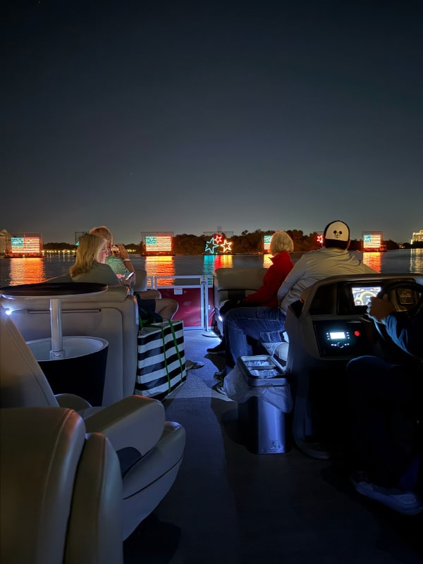 Electrical Water Pageant viewed from our fireworks cruise near Disney's Polynesian Village Resort