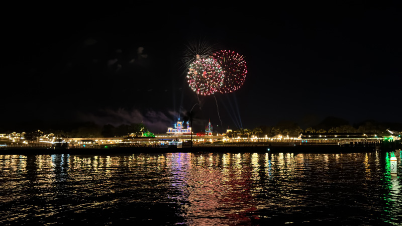 Multicolored Happily Ever After fireworks viewed from our Disney World fireworks cruise