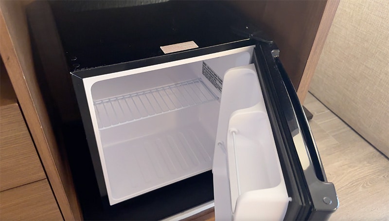 Mini fridge inside a Shades of Green guest room